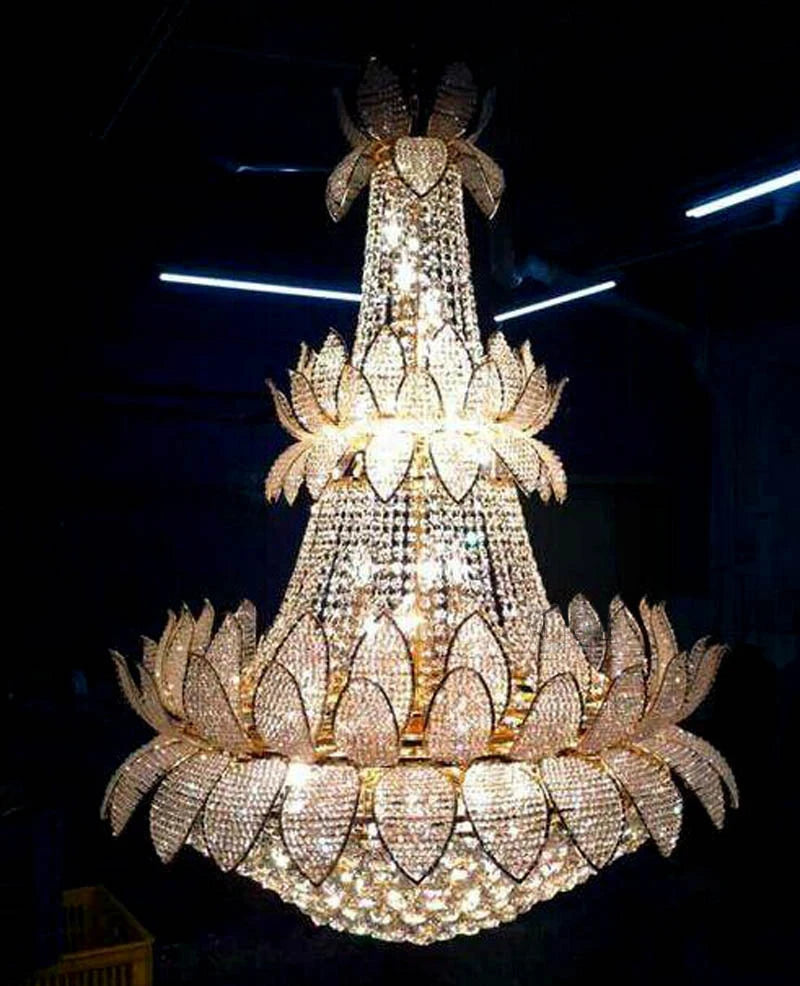 Gold and clear crystal chandelier with tiered lotus design, faceted petals