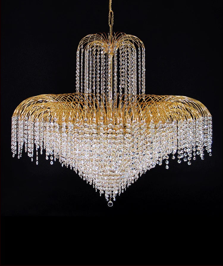 Gold-tone crystal chandelier with wide ring frame and cascading clear crystal strands