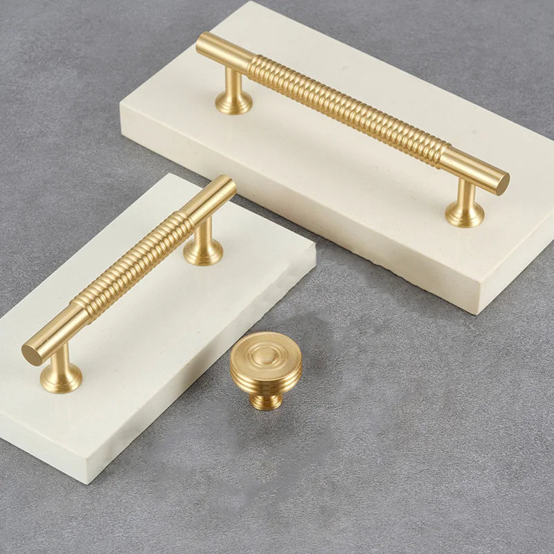 Textured brass cabinet pulls and bar handles in gold finish