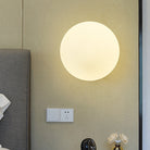 Modern Elegance Meets Warm Illumination: The Gold Opal Glass Wall Sconce