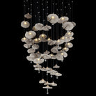 Mushroom-style ceramic chandelier with glowing white caps and hanging crystal drops