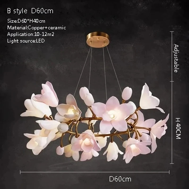 Ceramic flower chandelier with pink and white blossoms, round gold canopy and hanging rods