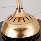 Close-up of gold ceiling fan motor housing with vented top plate