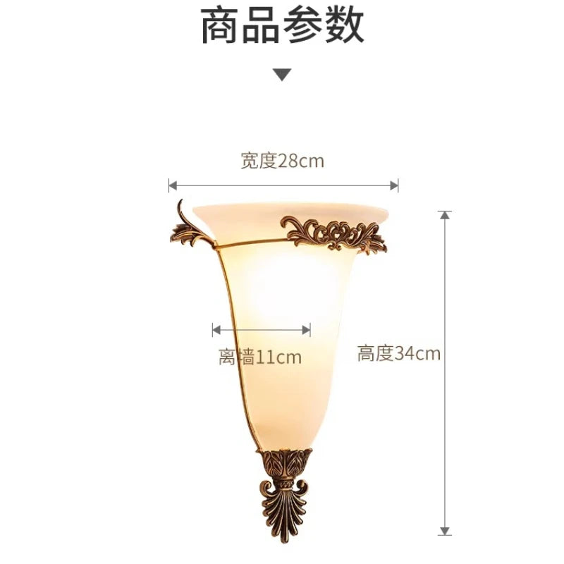 Gold retro wall sconce with frosted glass shade and floral metal finial