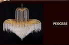 Gold-tone crystal chandelier with ring arms and hanging crystal drop fringe