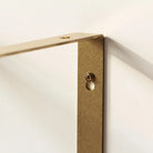 Antique brass triangle shelf bracket with wall plate and round mounting screw